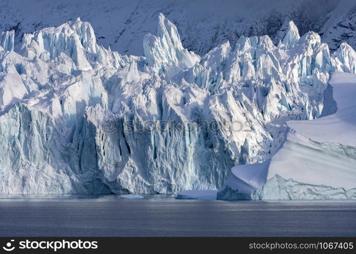 The terminus of the Monaco Glacier in Woodfjorden in the Svalbard Islands (Spitsbergen) in the high Arctic.