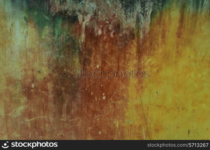 The texture of old concrete green wall closeup