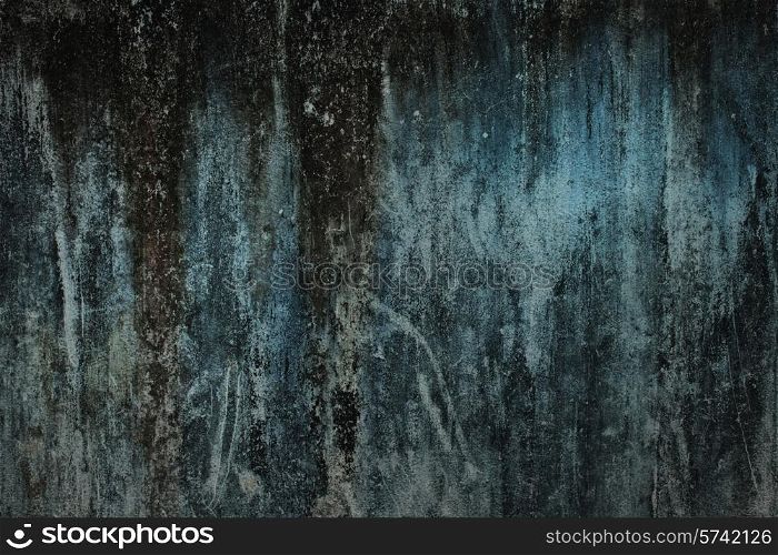 The texture of old concrete green wall closeup