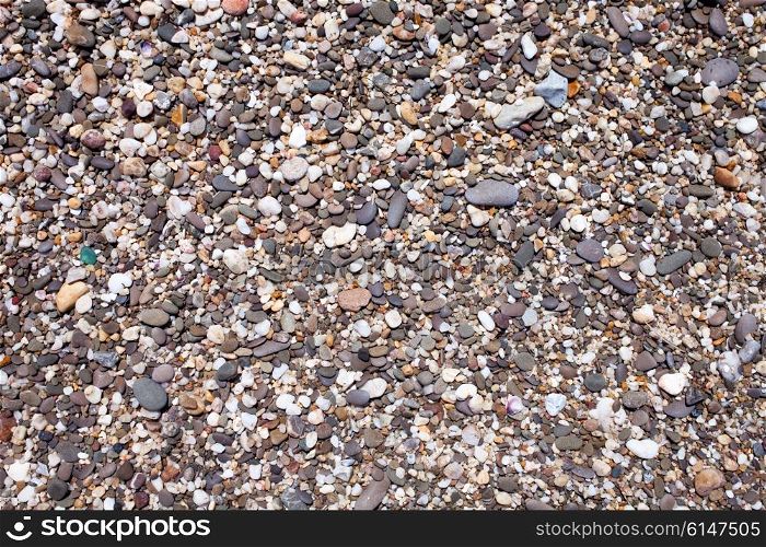 The texture of small pebbles on the beach