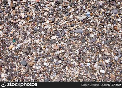 The texture of small pebbles on the beach