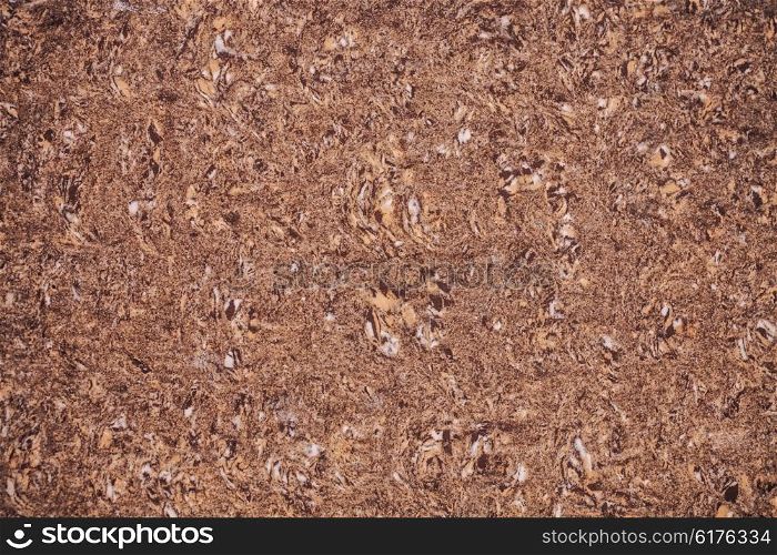 The texture of yellow and brown sandstone closeup