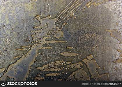 The texture on metal plates. Result of chemical reaction.