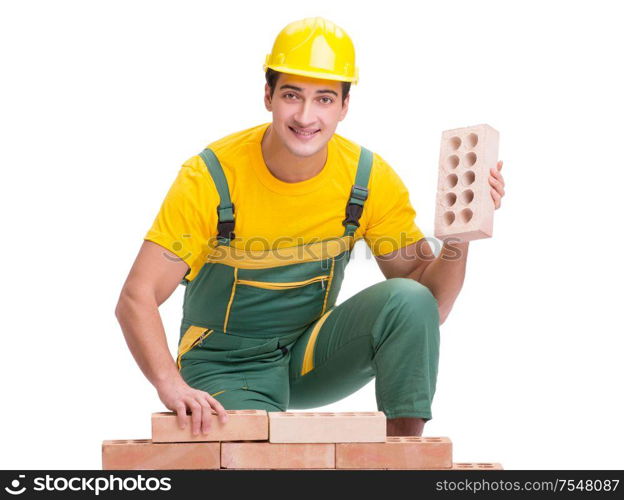 The the handsome construction worker building brick wall. The handsome construction worker building brick wall