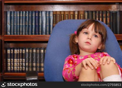 The thoughtful little girl. The three-year child of the European nationality