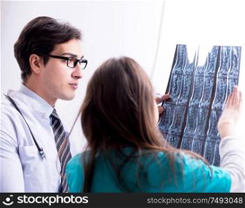 The three doctors discussing scan results of x-ray image. Three doctors discussing scan results of x-ray image