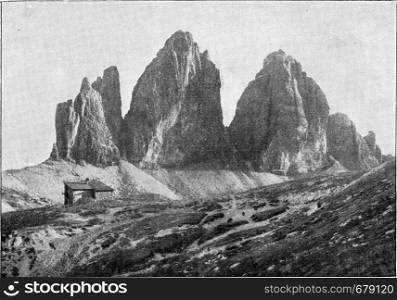 The Three Peaks of the Dolomites, vintage engraved illustration. From the Universe and Humanity, 1910.