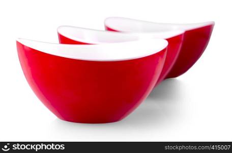 The three red plates on white background