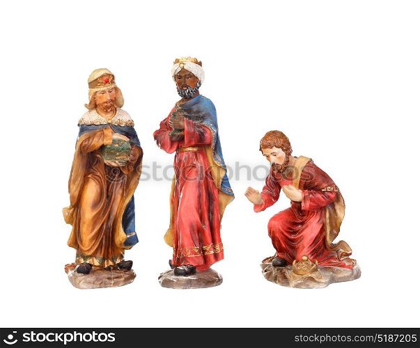 The three wise men. Ceramic figures isolated on white background