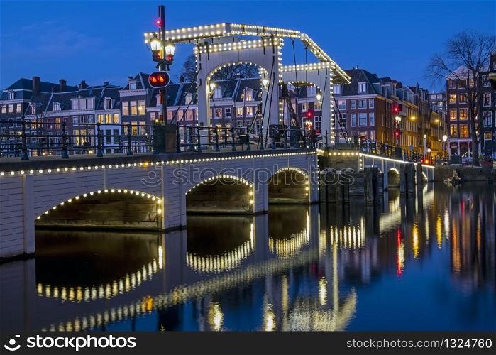 The Tiny Bridge at sunset in Amsterdam the Netherlands