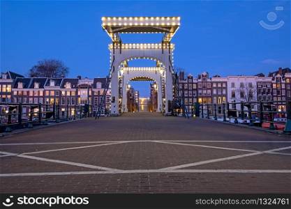The Tiny Bridge at sunset in Amsterdam the Netherlands