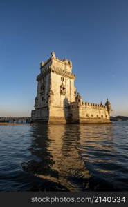 the Torre de Belem or Belem Tower at sunset on the Rio Tejo in Belem near the City of Lisbon in Portugal. Portugal, Lisbon, October, 2021