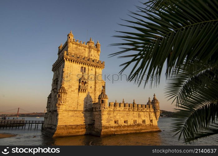 the Torre de Belem or Belem Tower at sunset on the Rio Tejo in Belem near the City of Lisbon in Portugal. Portugal, Lisbon, October, 2021