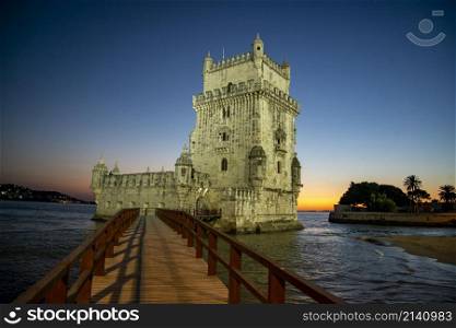the Torre de Belem or Belem Tower at sunset on the Rio Tejo in Belem near the City of Lisbon in Portugal. Portugal, Lisbon, October, 2021