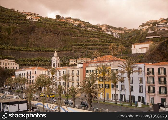 the town with the Church Nossa Senhora da Luz of Ponta do Sol, west of Funchal on the Island Madeira of Portugal. Portugal, Madeira, April 2018. PORTUGAL MADEIRA PONTA DO SOL