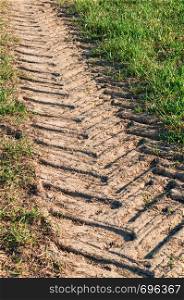 the trace of the tractor, dry soil in the field. dry soil in the field, the trace of the tractor