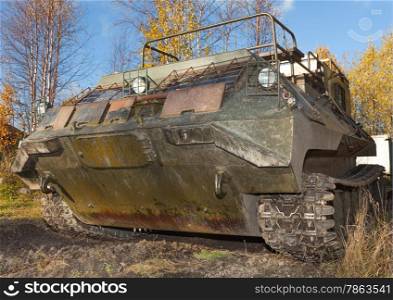 The tracked vehicle for transportation of soldiers in the real world