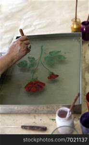 The traditional art of painting on the water. Process of creating drawings in ebru technique.Paper marbling