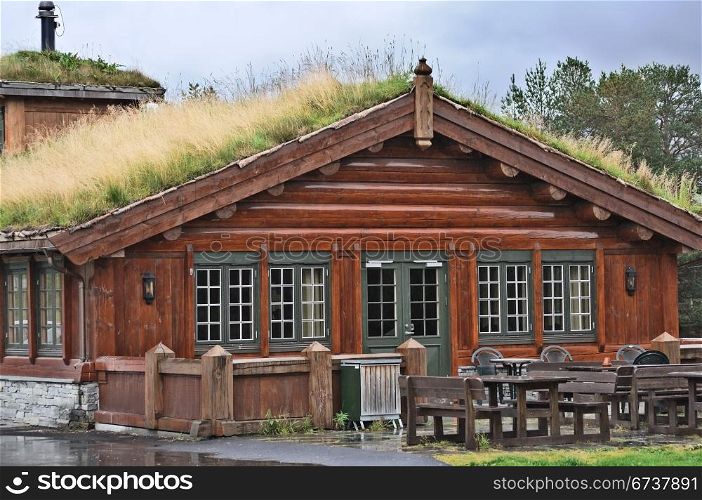 The traditional Norwegian building with a roof of grass