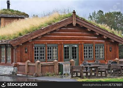The traditional Norwegian building with a roof of grass