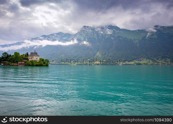 The traditional Swiss village of Iseltwald on the famous lake Brienz. Switzerland.. The Swiss village of Iseltwald on the famous lake Brienz.