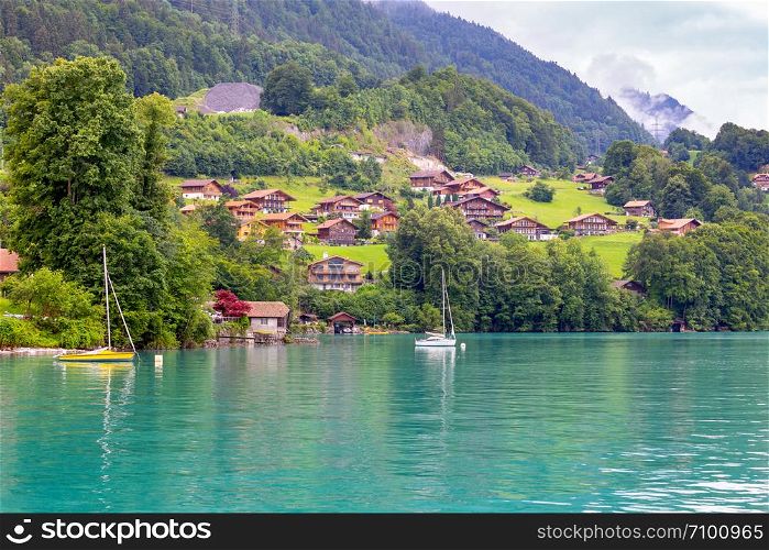 The traditional Swiss village of Iseltwald on the famous lake Brienz. Switzerland.. The Swiss village of Iseltwald on the famous lake Brienz.