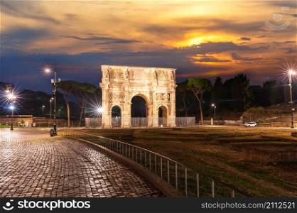 The Triumphal Arch of Constantine in twilight, Rome, Italy.