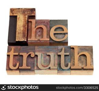 The truth word in vintage wood letterpress printing blocks, isolated on white
