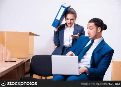 The two employees being fired from their work . Two employees being fired from their work 