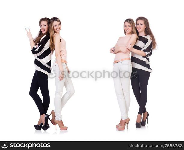 The two female friends isolated on the white. Two female friends isolated on the white