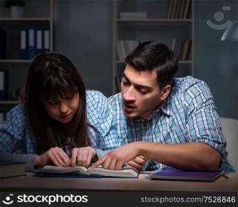 The two students studying late at night. Two students studying late at night