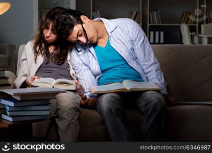 The two students studying late preparing for exams. Two students studying late preparing for exams