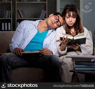 The two students studying late preparing for exams. Two students studying late preparing for exams