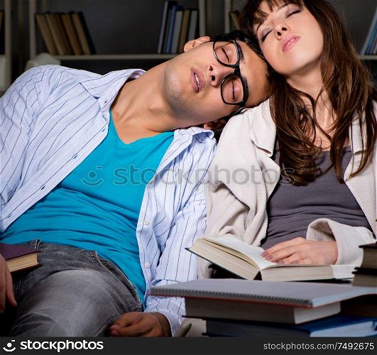 The two students studying late preparing for exams. Two students studying late preparing for exams