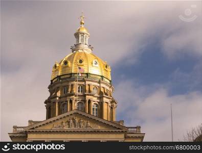 The US and State flags fly at Des Moines Capital