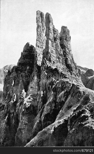The Vajolet towers in the Rosengarten chain, vintage engraved illustration. From the Universe and Humanity, 1910.