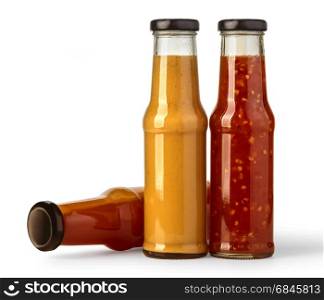 the various barbecue sauces in glass bottles isolated on white, with clipping path