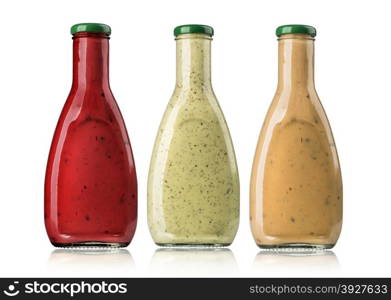 the various barbecue sauces in glass bottles with clipping path