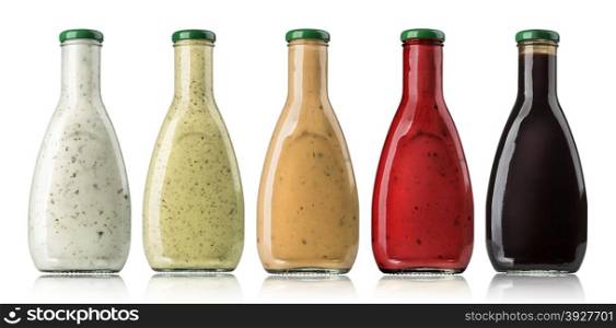the various barbecue sauces in glass bottles with clipping path