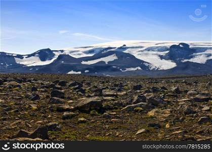 The Vatnajokull glacier and volcano with the barren, rock covered Tundra in front