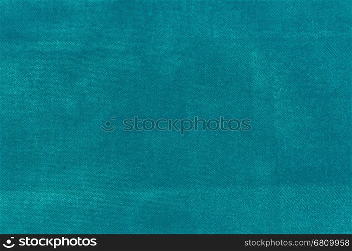 The Velvet fabric texture in turquoise color.