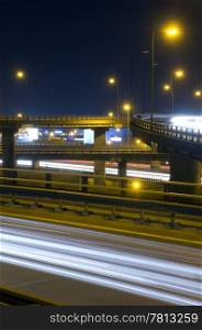The viaducts of a motorway junction at night