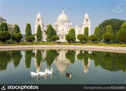The Victoria Memorial is a large marble building in Kolkata, West Bengal, India. It is dedicated to the memory of Queen Victoria.