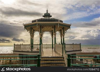 The Victorian bandstand near the beach in Brighton, UK.. The Victorian bandstand near the beach in Brighton