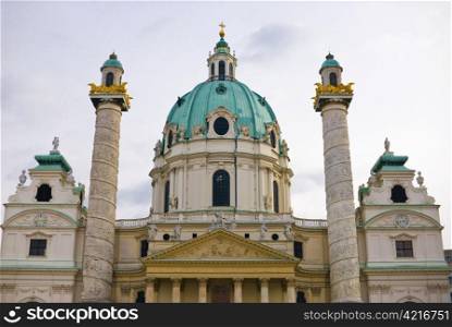 the viennese st. charles church is located at the karlsplatz in the first district of vienna near the ringstrasse. the architecture style is baroque.