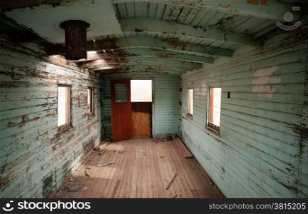 The view inside an abandoned railroad caboose car