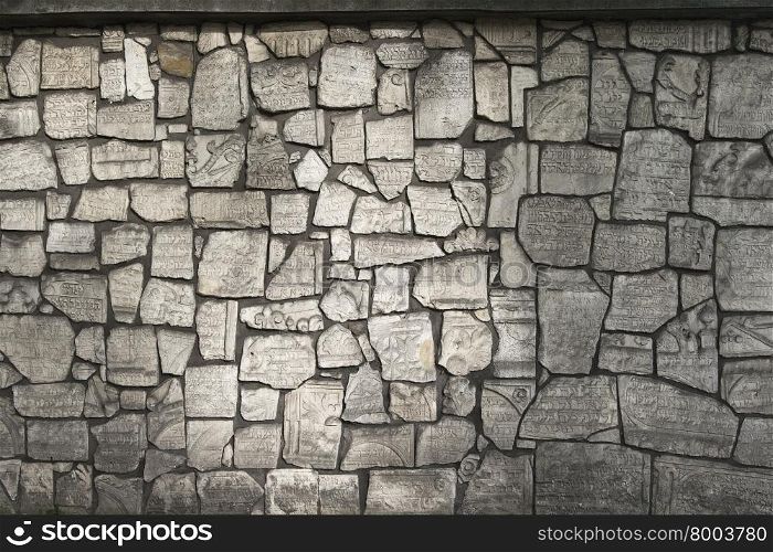 The wall is made from fragments of monuments in the Jewish cemetery