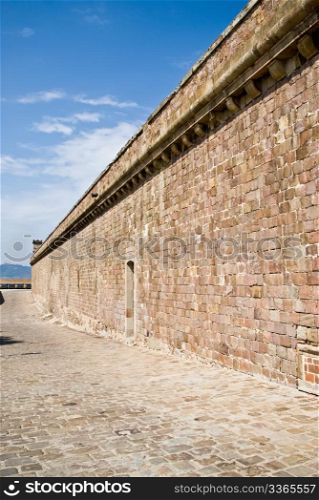 the wall of castell de montjuic