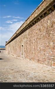 the wall of castell de montjuic