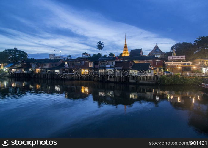 The wat Bot at the waterfront at of Chanthaboon on the Mae Nam Chanthaburi River in old town of the city of Chanthaburi in the north of Thailand. Thailand, Chanthaburi, November, 2018.. THAILAND CHANTHABURI WATERFRONT WAT BOT